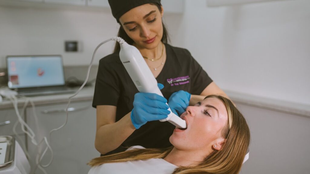 patient getting free invisalign 3d smile scan for assessment of future smile and next treatment plan at lodge causeway dental centre