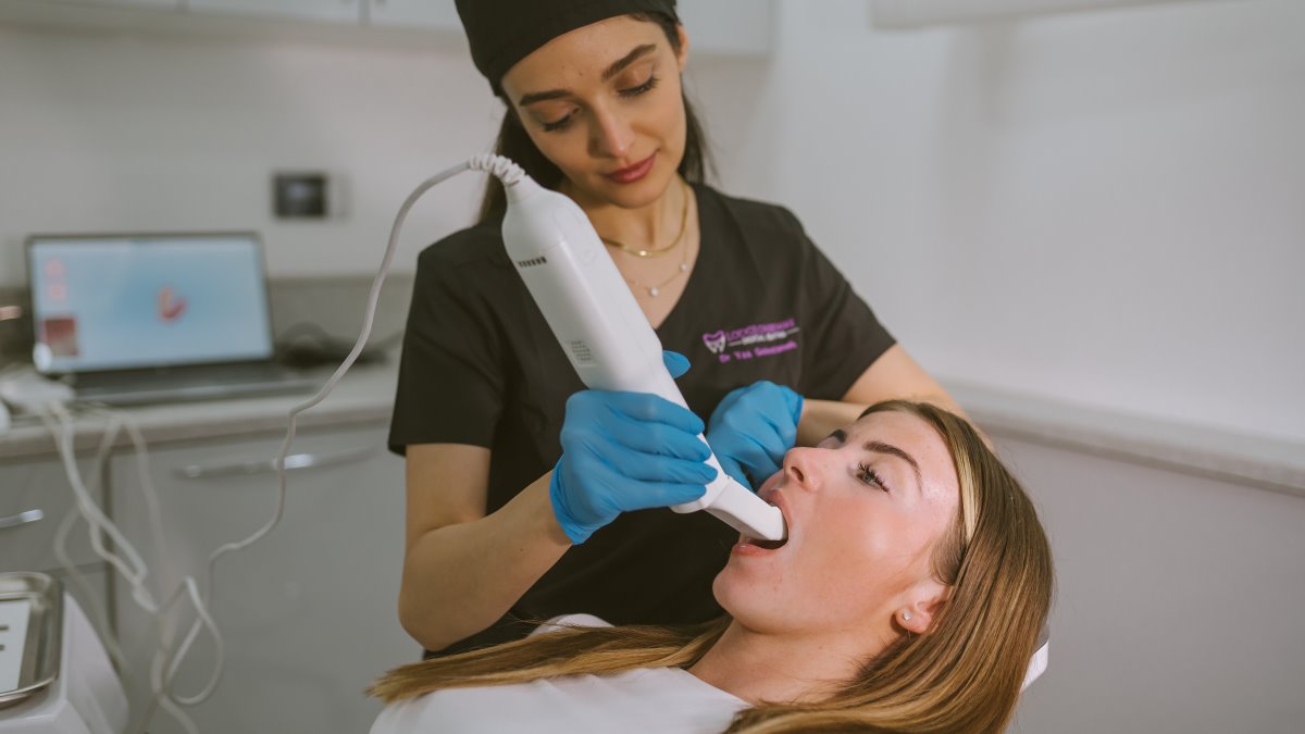 patient getting free invisalign 3d smile scan for assessment of future smile and next treatment plan at lodge causeway dental centre