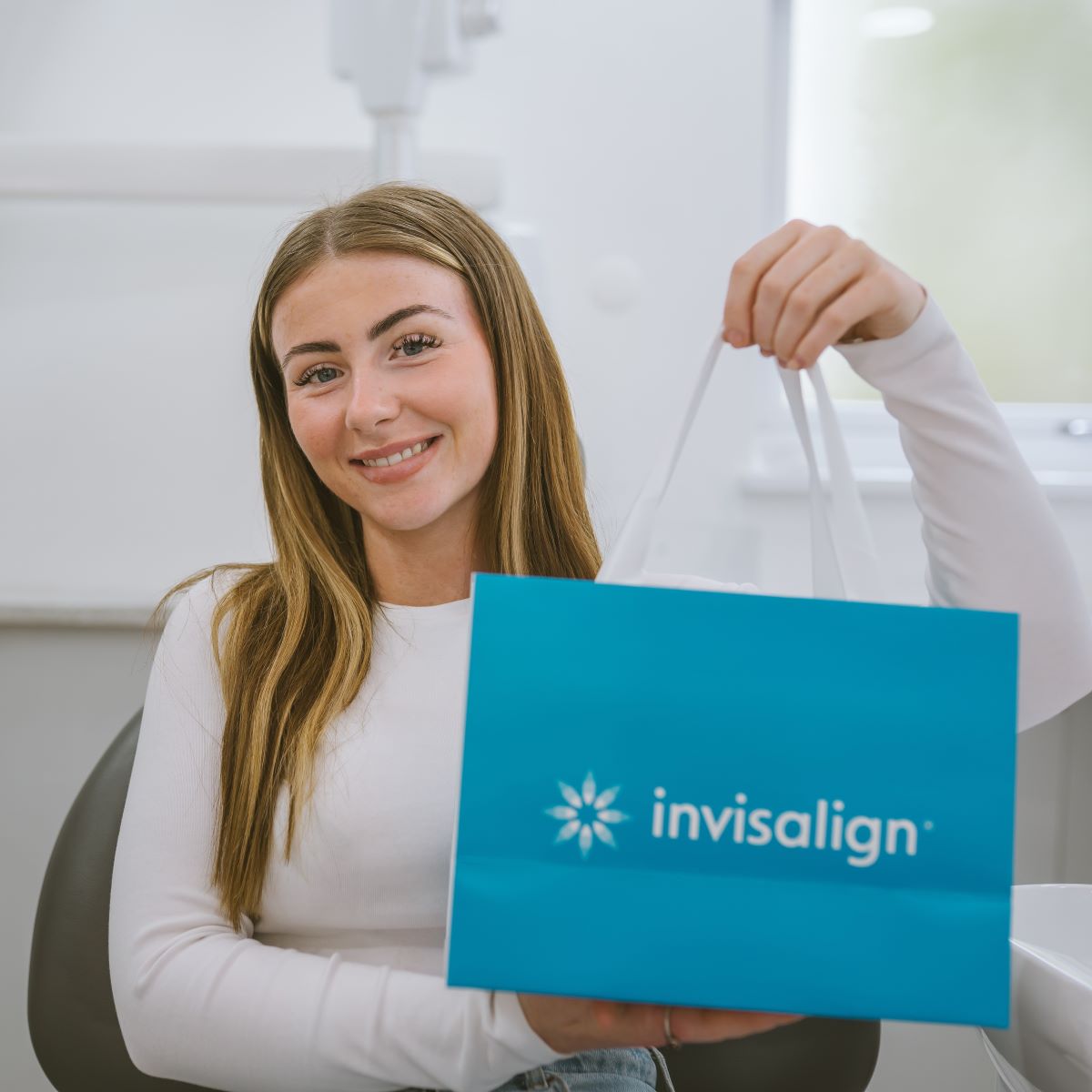 Young adult Invisalign patient representing clear aligner teeth straightening in Bristol